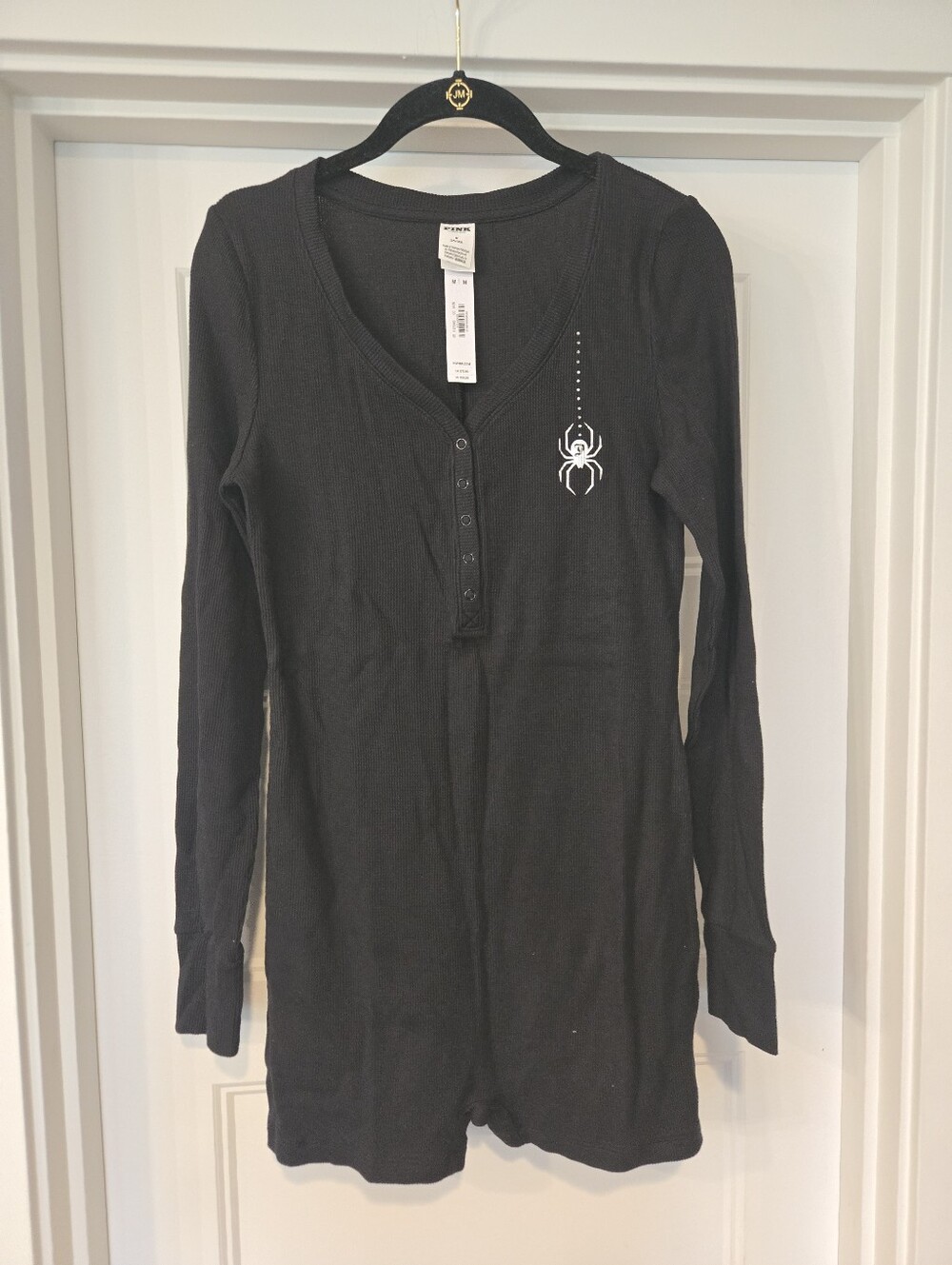 NWT!! Long Sleeve Black Short Romper with Crystal Spider and Web Graphic. Size M